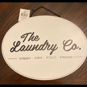 Hanging laundry sign
